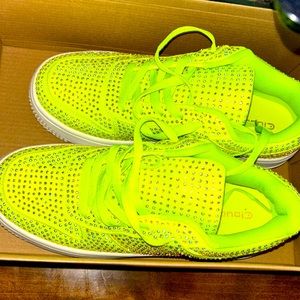 Lime green sneakers covered in rhinestones. New in box. Only tried on.Never worn